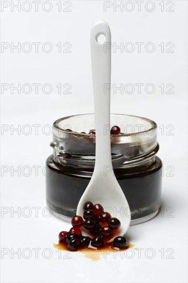 Aceto pearls in glass and spoon