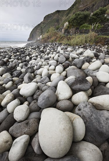 Coast with large round stones in Rocha da Relva