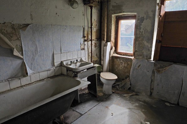 Rotten bathroom with tub