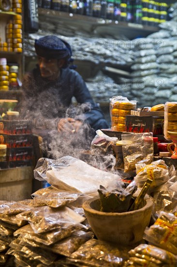 Fogged incense seller in the souq