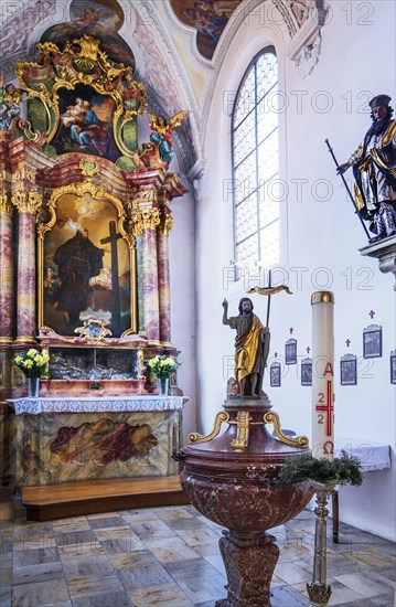 Side altar and baptismal font