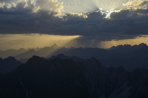 Sunrise with clouds over Allgaeu mountains