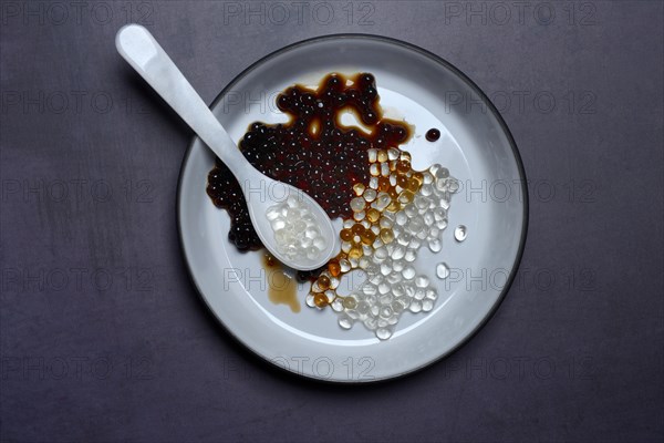 Aceto pearls with spoon in bowl