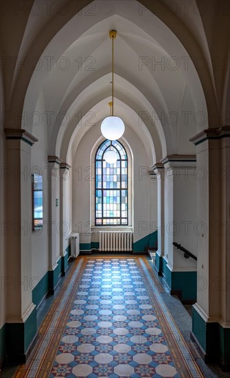 Staircase corridor with decorative windows in Sankt Hedwig Hospital