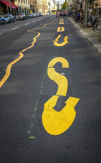 Crooked and crooked letters on a bus lane