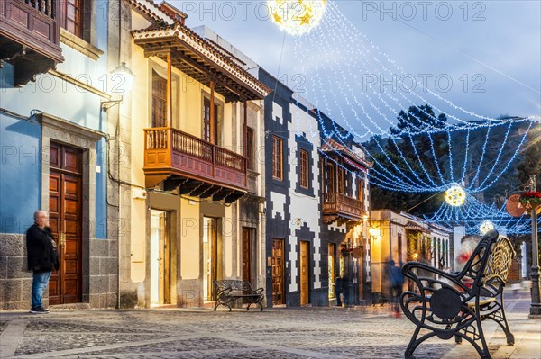 Illuminated main street in historic Teror