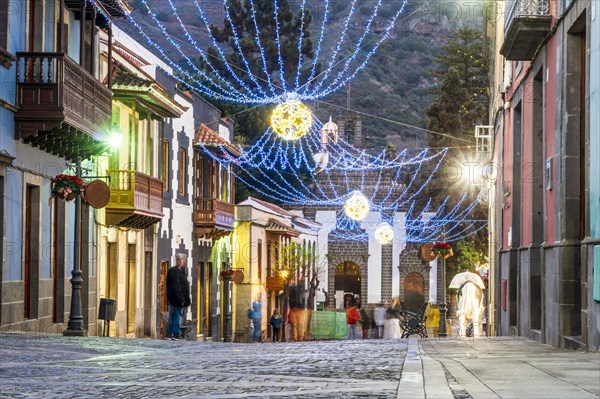 Illuminated main street in historic Teror