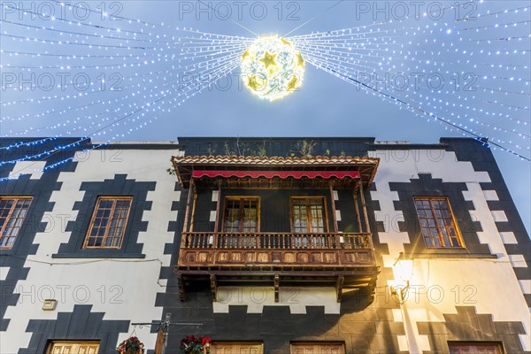 Illuminated main street in historic Teror