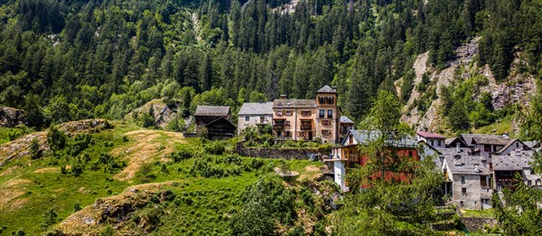 Characteristic old buildings in stone and wood in the village of Fusio