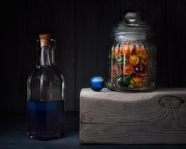 Still life with glass bottle