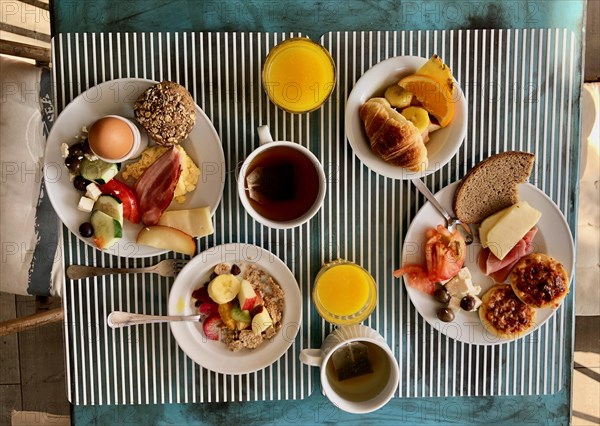 Set table with breakfast for two