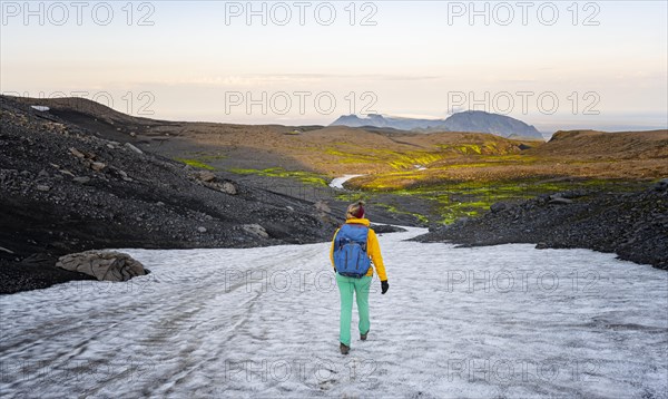 Hiker walks through spectacular landscape