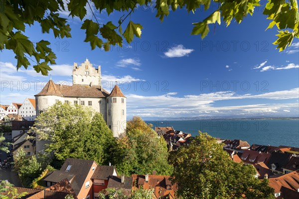 Meersburg Castle in the sunshine with a view of the Alps