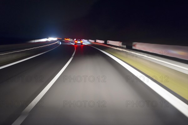 View from a Moving Car at Night on the Curvy Road