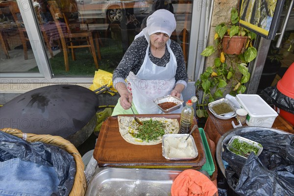 Drusin prepares a pita