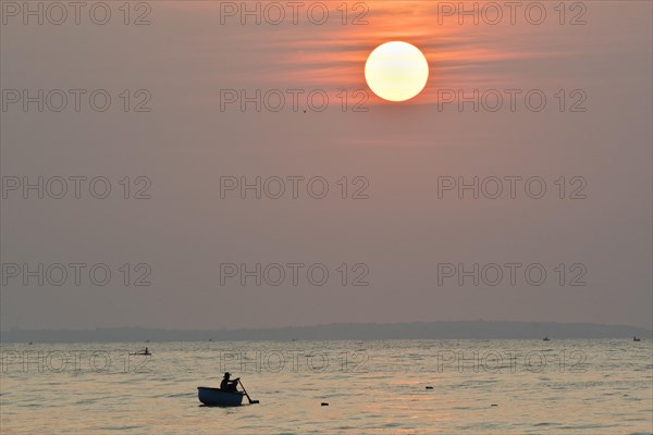 Fishing boats at sunrise