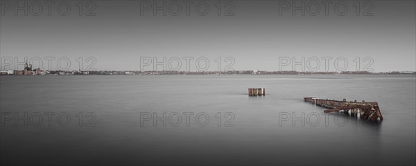 Long exposure of an old rusty jetty on the Baltic Sea coast off Stralsund