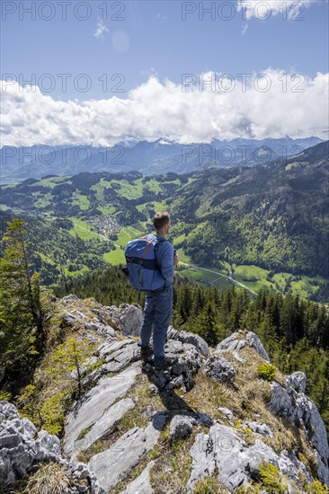 Hiker standing on a rock