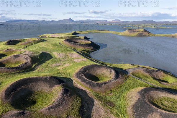 Aerial view of green volcanic crater