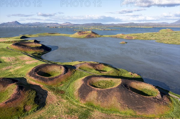 Aerial view of green volcanic crater