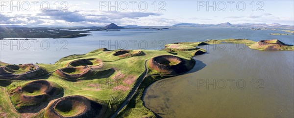 Aerial view of green volcanic crater