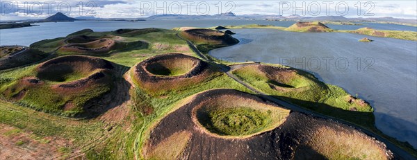 Aerial view of green volcanic crater