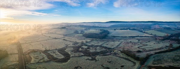 Sunrise panorama over RSPB Exminster and Powderham Marshes and River Exe