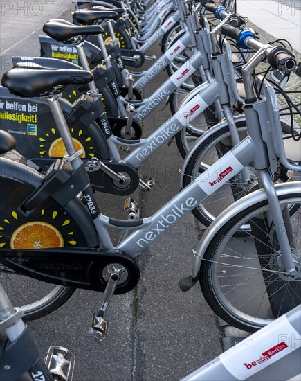 Electric rental bikes at the charging station in front of the Berlin House of Representatives