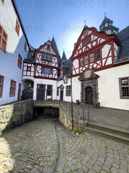 View from castle courtyard to buildings of Trier castle in double castle Buerresheim from the Middle Ages