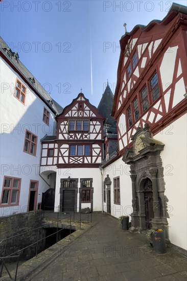 View from castle courtyard to buildings of Trier castle in double castle Buerresheim from the Middle Ages