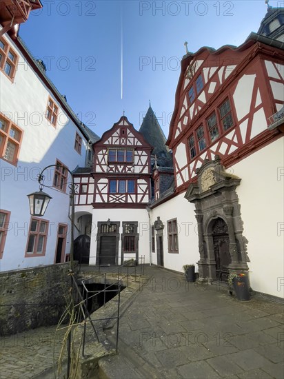 View from castle courtyard to buildings of Trier castle in double castle Buerresheim from the Middle Ages