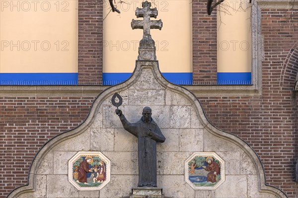 Sculpture of St. Anthony above the entrance portal of St. Anthony's Church