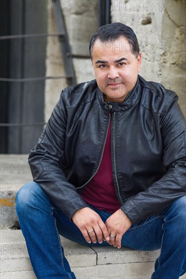 Headshot portrait of handsom hispanic man