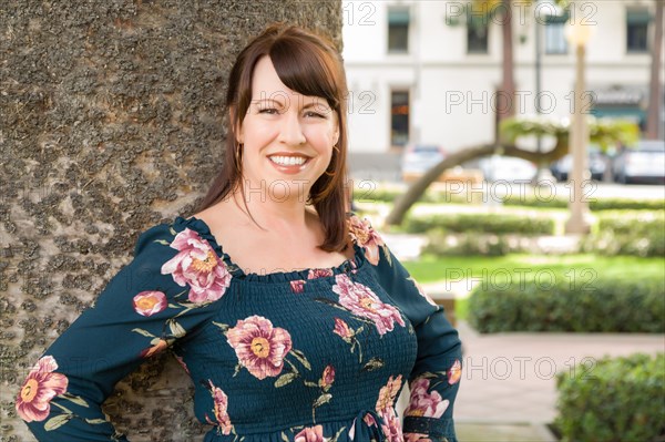 Headshot portrait of attractive caucasian woman