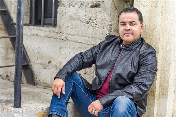 Headshot portrait of handsom hispanic man