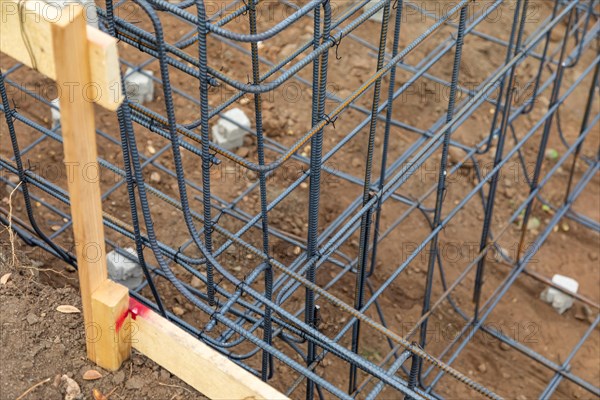 New steel rebar framing abstract at construction site