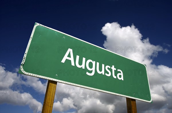 Augusta road sign with dramatic blue sky and clouds