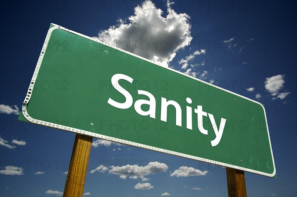 Sanity road sign with dramatic clouds and sky