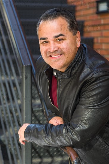 Headshot portrait of handsom hispanic man