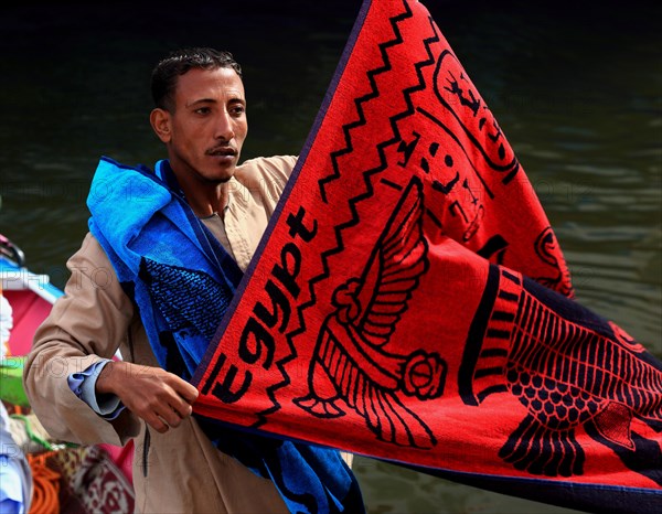 Souvenir seller with a rowing boat on the Nile