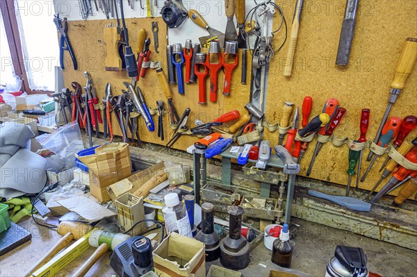 Workbench with tools in a saddlery in Allgaeu