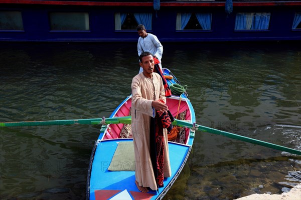 Souvenir seller with a rowing boat on the Nile