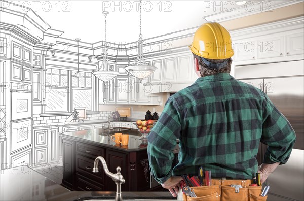 Male contractor with hard hat and tool belt looking at custom kitchen drawing photo combination on white