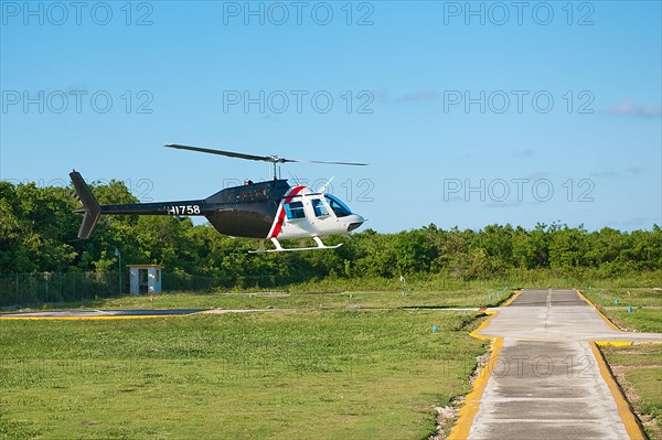 Helicopter type Bell 206B Jet Ranger III on approach