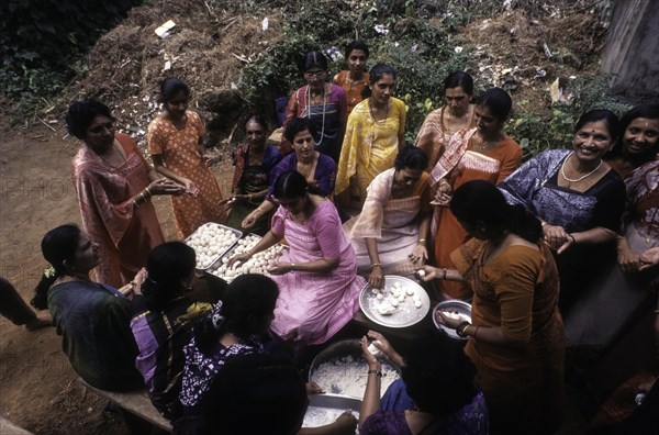 Kodava women making rice ball