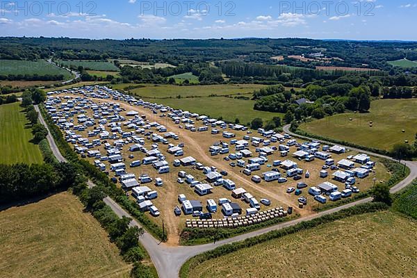 Aerial view of Gens de Voyage or Travelling People camp set up without permission in a field in Dirinon, Finistere Penn-ar-Bed department