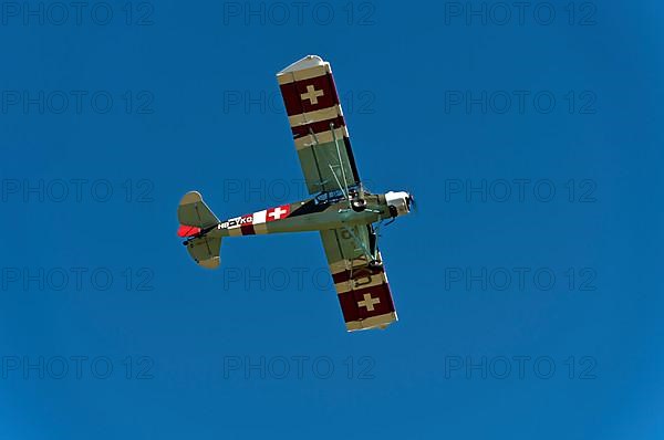 Vintage aircraft Slepcev Storch Mk IV HB-YKQ in flight, Switzerland