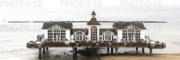 Sellin pier on the Baltic Sea island of Ruegen at fog