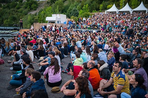 Floating stage on Lanuza reservoir at Pirineos Sur International Festival of Cultures in Sallent de Gallego