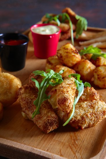 Wooden plate with snack for beer